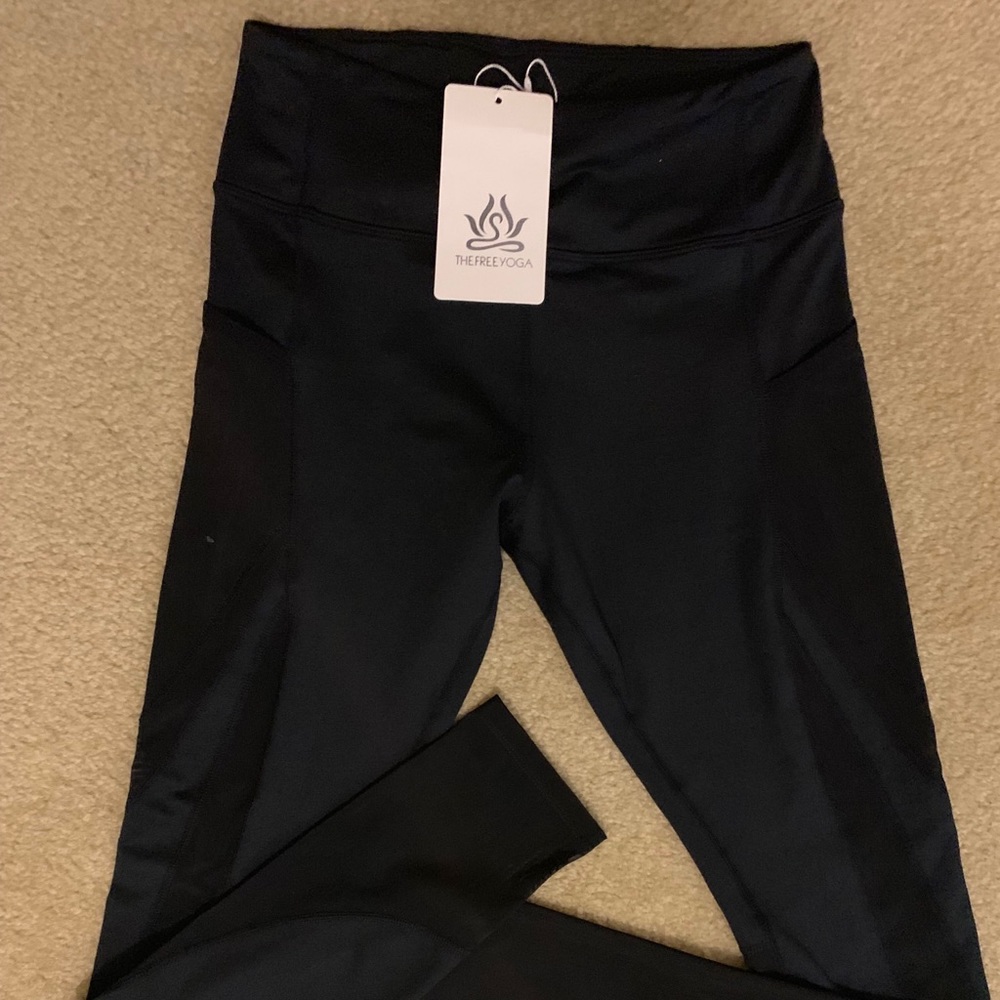 The Free Yoga Black Pants NWT. Sheer detail.  Sz M